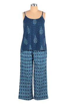 Add a refreshing touch to your wardrobe with this gorgeous creation crafted from cotton by Indian artisan Aftab. In a palette of blue shades, the pajama set includes a camisole with adjustable straps and elastic-waist pants with pockets. Furthermore, each garment presents a complementary design: the top has speckled leafy motifs, and the bottom features a Moroccan trellis pattern, making a unique set. Blue Block Print Summer Sets, Summer Blue Block Print Sets, Cotton Matching Set Tops For Pajama Party, Casual Blue Sets For Pajama Party, Spring Blue Cotton Sets, Blue Cotton Sets For Spring, Blue Block Print Spring Sets, Cotton Pant Set With Relaxed Fit, Sleeveless Cotton Pant Set For Summer