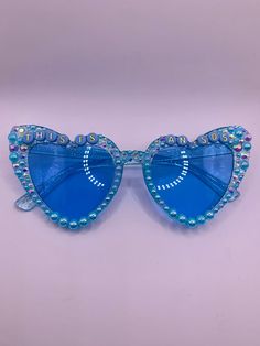 Heart Shaped Glasses Blue Pearls Blue Letters  SOS - Jonas Brothers 5 Albums 1 Night Tour Blue Sunglasses For Spring Party, Blue Tinted Sunglasses For Party, Jonas Brothers Concert Bracelets, Blue Sunglasses With Uv Protection For Parties, Wings Jonas Brothers, Fun Blue Sunglasses For Parties, Blue Tinted Sunglasses For Parties, Fun Blue Sunglasses For Party, Blue Tinted Party Sunglasses