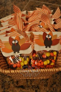 a basket filled with candy and candies on top of a counter