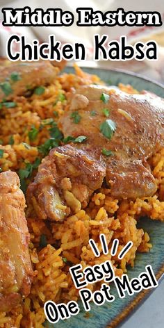 chicken kabab on a plate with rice and cilantro