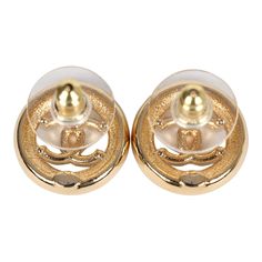 These Chanel CC round stud earrings feature a gold tone round cut-out detail stud earring with white enamel trim accented with mini gold tone CC's and one large black enamel CC logo in the center with post back closures.Origin: ItalyCondition: New and never wornAccompanied by: Chanel box, jewelry box, carebook, retail UPCMeasurements: 0.6" x 0.6" Chanel Box, Mini Gold, Birkin 25, Round Stud Earrings, Earrings White, Box Jewelry, Gold Enamel, Cc Logo, White Enamel