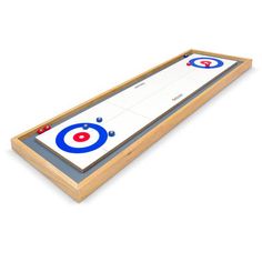 an image of a wooden table top hockey rink with target on the side and arrows pointing up to the goal