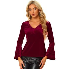 Elevate your style in this V-neck blouse made from soft velvet. There's nothing like a touch of velvet to elevate your style, and this blouse also features a V-neck and elastic waist for a put-together look. This velvet blouse is perfect for pairing with everything high-rise in your closet. Get your shimmer on in this chic yet simply styled velvet blouse. The V-neck design shows your beautiful neckline perfectly. Velvet Tops For Fall Night Out, Elegant Velvet Tops For Fall, Party Velvet V-neck Top, Velvet V-neck Party Top, Chic Fitted Velvet Blouse, Chic Velvet Tops For Fall, Chic Long Sleeve Velvet Blouse, Elegant Fitted Velvet Blouse, Elegant V-neck Top For Fall Parties