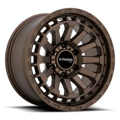 an image of a wheel that is brown and has black spokes on it, with the