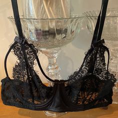 New Without Tags Black Lace Bra. Bra Was Bought But Never Worn Due To Sizing Not Fitting. Bra Has A Very Sexy Design With Two Strings On Each Side Of Chest. Black Sheer Underwire Bra, Partially Lined Low-cut Black Bra, Black Low-cut Partially Lined Bra, Black Partially Lined Low-cut Bra, Black Underwire Bra With Lace Trim, Black Underwire Bra For Night Out, Black Low-cut Bra With Lace Closure, Low-cut Black Bra With Lace Closure, Black Lace Party Bra