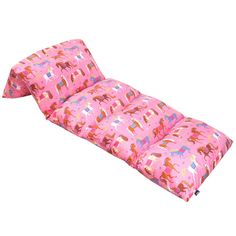 a futon mattress with horses on it and pink sheets for the bottom part of the bed