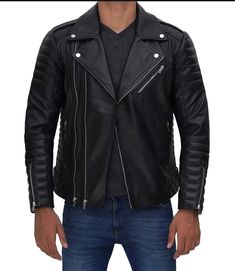 A men's biker style real leather jacket is a popular fashion item known for its rugged, edgy look and durable material. Key features often include: Material: Made from genuine leather, which provides durability and a sleek appearance. Design: Typically features a fitted design, often with a cropped length to the waist. Collar: Often includes a wide lapel or snap-down collar. Zippers: Prominent zippered pockets and front closures, sometimes with asymmetrical designs. Hardware: Metal studs, buckles, and other hardware details add to the rugged aesthetic. Pockets: Multiple pockets for functionality and style. Lining: May have a quilted or smooth lining for comfort and additional warmth. Biker leather jackets are versatile and can be worn casually with jeans and a t-shirt or dressed up with dr Mens Biker Style, Asymmetrical Leather Jacket, Maroon Leather Jacket, Dark Brown Leather Jacket, Leather Jackets For Men, Cafe Racer Leather Jacket, Asymmetrical Style, Shirt Collar Styles, Travel Jacket