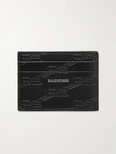 a black card case with the word balenoca on it and an embossed pattern