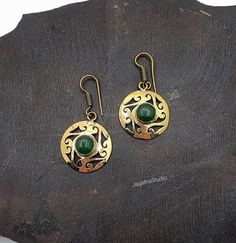 HANDMADE Stunning boho beautiful drop dangle mandala earrings. With beautiful details and Green Onyx gemstones. Ideal for everyday wear or for a special bohemian look. Aprox Length: 4 cm Aprox diameter: 2.2 cm Handmade with high quality hypoallergenic Jewelery brass, nickel free. LINK Please follow the link to view my shop for other beautiful pieces. https://www.etsy.com/uk/shop/JagathaStudio Bohemian Teardrop Danglers For Gifts, Bohemian Danglers With Intricate Design, Bohemian Brass Drop Earrings, Bohemian Brass Drop Danglers, Bohemian Brass Danglers, Bohemian Pierced Danglers As Gift, Bohemian Filigree Danglers For Gift, Bohemian Filigree Danglers, Bohemian Round Danglers As Gift