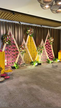 a decorated stage with flowers and lights