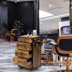 a hair salon with chairs and tables in the middle of it, all made out of wood