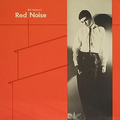 a man standing in front of a red and black poster with the words red noise on it