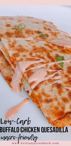 a quesadilla cut in half on a white plate with the words low carb buffalo chicken quesadilla