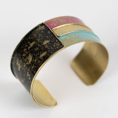 Confident and bold—express yourself with the Protection Cuff Bracelet. Handcrafted in brushed brass with colored enamel by artisans with Tara Projects in India. Modern Multicolor Cuff Bangle Bracelet, Modern Multicolor Bangle Cuff Bracelet, Brushed Brass, Cuff Bracelet, Cuff, Brass, Color