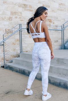 Stay ready for greatness in this white camo sports bra! Train for anything in this gorgeous sports bra and complete the look with the matching camo leggings! White camo sports bra Pink, gray and white tones Padding included Criss Cross Back Runs true to size Pair with the matching Stay Ready Camo High Waisted Leggings Piper is 5'3, wears a size 2 and is wearing a Small! White Fitted Activewear For Gym, Fitted White Activewear For Gym, White High Stretch Sports Bra For Running, White High Stretch Squat Proof Activewear, White Athleisure Activewear For Workout, White Moisture-wicking Activewear For Workout, White Athletic Fit Athleisure Activewear, White Athleisure Activewear With Athletic Fit, White Athleisure Sports Bra For Gym