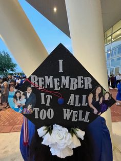 a graduation cap that has been decorated with pictures of people and flowers on the front