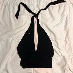 Never Worn, Soft, Stretchy, Good Condition Chic Black V-neck Halter Top, Black Stretch Halter Neck Crop Top, Black Stretch Halter Neck Top, Black Halter Neck Crop Top For Evening, Black Halter Neck Top For Spring, Casual Black Stretch Halter Top, Black V-neck Club Tops, Fitted Sleeveless Black Halter Top, Black Fitted Halter Neck Top