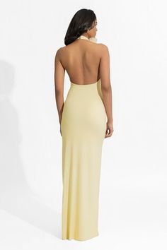 Butter yellow halter neck dress in flowy silhouette with placed applique floral patterns. - Aza Fashions Sleeveless Backless Dress For Spring Gala, Stretch Halter Neck Evening Dress, Spring Gala Sleeveless Backless Dress, Spring Gala Long Halter Dress, Spring Gala Maxi Dress With Back Opening, Summer Backless Stretch Dress, Summer Gala Long Backless Dress, Stretch Halter Neck Wedding Dress, Summer Evening Stretch Backless Dress