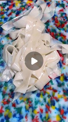 a video demonstrating how to make pasta with plastic wrappers and watercolors on paper