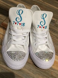 Make your day extra special with these beautiful Embroidered Converse sneaker with your wedding date on the tongue and Bride on the side. Other options are available but you MUST specify if you want something different You can choose either all black or all white, they have NO lines around the sole as others do. I also offer traditional sneaker with the red stripe. You can customize what the tongue says. you can do name or monogram with or without a date. You can even put the date on the side. T White Sneakers With Laces For Bridal Shower, White High-top Sneakers For Wedding, White Low-top Wedding Shoes For Bride, White Low-top Wedding Shoes For Bridal Shower, White Round Toe Wedding Shoes For Destination Wedding, Custom White High-top Wedding Sneakers, White Round Toe Sneakers For Bridal Shower, Customizable White Sneakers For Wedding, White Low-top Bridal Sneakers