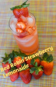 red robin strawberry lemonade is garnished with fresh strawberries