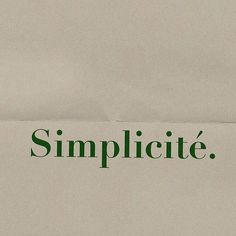 a piece of paper with the word simplicie written on it in green ink