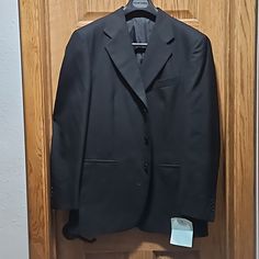 Black, 3 Button Suit Jacket Size 40 Made In Italy 100% Lana (Wool) Dry Clean Only Formal Tuxedo Blazer With Button Closure, Professional Black Single Breasted Sport Coat, Fitted Business Blazer With Horn Royal Black Buttons, Tailored Blazer With Black Horn Buttons For Semi-formal Occasions, Formal Long Sleeve Sport Coat With Buttons, Business Tuxedo Blazer With Button Closure, Classic Black Career Blazer, Uniform Tailored Suits For Workwear, Professional Formal Blazer With Button Closure