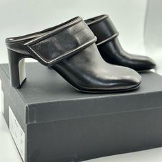 Gorgeous Mid-Heel Slides With Exquisite Leather Craftsmanship Made In Italy For Rag And Bone. Msrp: $525 Size : Euro 37 / Usa 7 Color: Black Shoes Are New With Tags And Are As Pictured. Includes Authenticity Card And Includes Branded Dust Bag. These Are Luxury, Timeless, Classy Shoes With European Craftsmanship To Last! Elegant Slip-on Mules With Heel Loop, Formal Slip-on Mules With Heel Loop, Chic Leather Shoes With Contrasting Heel Counter For Work, Chic Leather Shoes With Contrasting Heel For Work, Calf Leather High Heel Mules For Office, Designer Mules With Contrasting Heel For Work, Elegant Calf Leather Mules With Stacked Heel, Designer Mules With Sculpted Heel For Office, Business Mules In Calf Leather