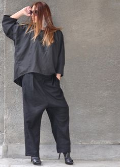 Black Linen Two Piece Outfit with Drop Crotch Pants and Wide Linen Blouse.  Wide Leg Pants Set is so comfy and easy to wear at the same time a touch of elegance and style. Handmade with care in a Pet-free and Smoke-free environment! Made of : 100% Linen The model wears size M - 5,6' / 170 cm Available Size: XS, S, M, L, XL, 2XL,3XL, and custom order. CARE Machine Wash 30oC Hand Wash with warm water Medium hot iron Tumble Low Hang to Dry for Best Results Thank you for visiting my shop. www.EUGfas Casual Relaxed Fit Pant Set With Pockets, Casual Sets With Pockets And Straight Pants, Casual Sets With Relaxed Fit Ankle-length Pants, Casual Relaxed Fit Pant Set For Work, Casual Pant Set With Relaxed Fit Straight Pants, Casual Cotton Pant Set With Straight Pants, Casual Sets With Relaxed Fit Trousers, Casual Workwear Sets With Trousers, Casual Workwear Trousers Set