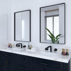 a bathroom with two sinks, mirrors and plants in vases on the counter top