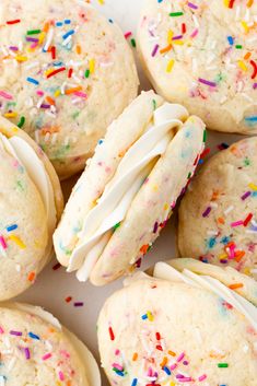 sprinkles and white frosting on some cookies