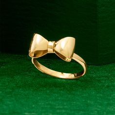 Ross-Simons - Italian 14kt Yellow Gold Bow Ring Size 7. Delicate bows will always be in style! Crafted in Italy, this sweet and shiny bow ring glows in polished 14kt yellow gold. 1/4" wide. 14kt yellow gold bow ring. Yellow Gold Bow Jewelry For Anniversary, Yellow Gold Bow Jewelry For Formal Occasions, Formal 14k Gold Jewelry With Bow Detail, Yellow Gold Bow Jewelry For Wedding, Yellow Gold Wedding Jewelry With Bow, Gold Bow Rings For Wedding, Gold Bow Ring For Anniversary, Gold Rings With Bow For Formal Occasion, Formal Gold Rings With Bow Detail