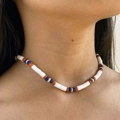 🌊 Dive into Bohemian Beach Elegance! Unveiling our Round White Puka Shell and Orange, Blue, and Beige Coconut Necklace! This piece is a beautiful amalgamation of the ocean's treasures, meticulously crafted to accentuate your bohemian beach style. It's a symbol of adventure, freedom, and a profound connection with nature, making it a perfect companion for beach lovers and adventure seekers. 🏝️ Ocean & Surfer Lifestyle Inspiration: Inspired by the rhythmic waves and the relaxed surfer lifestyle, this necklace is a tribute to the spirit of adventure, exploration, and the natural beauty that the beach embodies. It's a versatile piece that resonates with the thrill of the ocean and the tranquil allure of sandy shores. 🌟 Trendy & Versatile Design: Featuring unique round white puka shells and Hippie White Beaded Necklace For Festivals, White Hippie Beaded Necklace For Festivals, Hippie Style White Beaded Necklace For Festivals, White Bohemian Beaded Necklace For Vacation, White Hippie Necklace For Beach, White Hippie Necklace For The Beach, Hippie White Necklace For The Beach, White Bohemian Beaded Necklaces For Beach Season, White Beaded Beachy Necklace For Festival