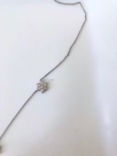 Metal: 14K White Gold Stone: Diamond Stone Shape: Round Diamond Total Weight: .50 ct. Type Of Closer: Spring Clasp Weight of entire piece with stones: 2.50 Grams Circumference Of Each Flower: 7.50 mm Length Of Necklace: 16 Inches Type of chain: 1mm Rolo Chain Customization: We can custom make this necklace and/or earrings with any gems and metals, with any amount of flowers you would like, and in any length. We can also custom make a matching bracelet. Please inquire if interested. Matching Earr Amethyst And Diamond Ring, Matching Bracelet, Gold Stone, Station Necklace, Diamond Flower, Matching Band, Rolo Chain, Gold Floral, Matching Bracelets