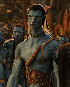 the avatars from avatar are all dressed in blue and brown