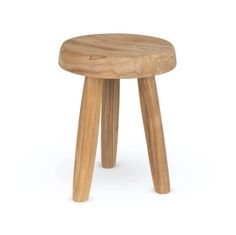 a small wooden stool sitting on top of a white floor