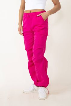 Stand out from the crowd in these fashionable Love Tree Nylon Cargo Baggy Parachute Pants for Women in Pink! The lightweight and durable nylon material provides comfort and functionality, while the vibrant magenta color adds a touch of fun to your wardrobe. Be confident and stylish in these statement pants!Features:Love TreeStyle: 6866PN-MAGENTAColor: Pink 100% NylonWomen’s pantsOne cargo side pocketHand side pockets Elastic waistbandMoisture wickingSoft lite material Drawstring waistband and ankle hem Measurements from size small:Waist: 26” Front Rise: 11” Back rise: 13” Inseam: 31"Machine wash cold, line dry Baggy Parachute Pants, Statement Pants, Magenta Color, Love Tree, Small Waist, Drawstring Waistband, Side Pocket, Parachute Pants, Moisture Wicking