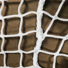 a close up view of a white net