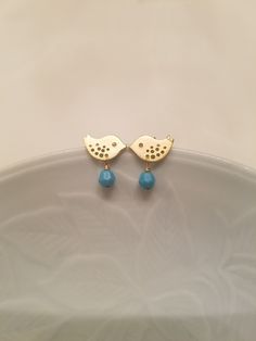 This sweet personalized birthstone earrings will give whole lot of meaning to special someone as a gift or to keep it yourself two beautiful love birds cut out of brass adorned with swarovski birthstone and connected to sterling silver post. bird measures 10mm x 6mm very cute look in my store for matching necklace available in bigger size 17mm x 10mm: https://www.etsy.com/listing/62790829/september-birthstone-post-earrings https://www.etsy.com/listing/62525570/birthstone-16k-gold-plated-love-bir Cute Turquoise Jewelry As A Gift, Cute Turquoise Jewelry For Gift, Cute Turquoise Jewelry For Gifts, Cute Turquoise Jewelry Gift, Bird-shaped Jewelry Set With Matching Earrings, Cute Hypoallergenic Turquoise Jewelry, Earrings White Gold, Birthstone Earrings, Earrings Turquoise