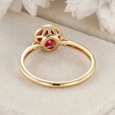 Art Deco 14K Solid Gold Vintage Round Cut Ruby Bezel Ring—a timeless and elegant choice that beautifully showcases the fiery allure of a round-cut ruby gemstone set in the vintage charm of 14k solid gold. Luxury Ruby Ring With Round Stone, Formal Ruby Cluster Ring, Formal Ruby Birthstone Ring, Luxury Yellow Gold Ruby Ring With Bezel Setting, Gold Ruby Ring With Bezel Setting, Heirloom Style, Classic Ruby Halo Ring, Luxury Yellow Gold Round Ruby Ring, Heirloom Gold Ruby Ring With Bezel Setting, Luxury Yellow Gold Ruby Ring