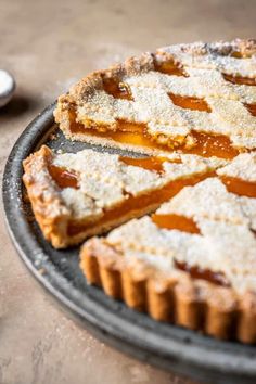 a pie sitting on top of a metal pan