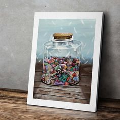 a painting of a glass jar filled with lots of colorful beads on top of a wooden table