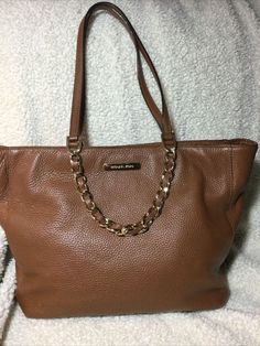 MICHAEL KORS JET SET LARGE TOTE BROWN LEATHER WOMEN'S HANDBAG~15” X 10”. Please see pictures for more details on overall condition. Inside in like new condition. Some wear on the corners. See pictures for more details. Pet and smoke free home. Michael Kors Fall Bags, Fall Brown Shoulder Bag With Branded Hardware, Michael Kors Shoulder Bag With Leather Lining, Michael Kors Leather Lined Everyday Shoulder Bag, Michael Kors Brown Soft Leather Shoulder Bag, Michael Kors Soft Leather Tote Shoulder Bag, Kors Jet Set, Large Tote, Michael Kors Jet Set