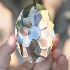 a person holding a crystal ball in their hand