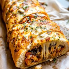 a cheesy bread filled with meat and cheese