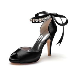 a high heeled shoe with an ankle strap and jewel embellishment on the side