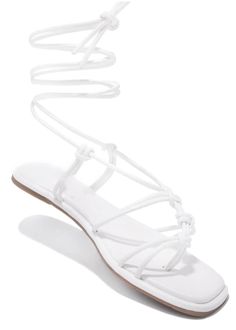 SIZE & FIT HEEL HEIGHT APPROX: 0.5" SHOE MODEL SUGGESTION: TRUE TO SIZE ALL MEASUREMENTS ARE MADE ON A SIZE 6.5 THERE MAY BE SLIGHT MEASUREMENT VARIATIONS BASED ON SIZE. PRODUCT DETAILS ADJUSTABLE AROUND-THE-ANKLE LACE-UP CLOSURE STRAPPY ASYMMETRIC DETAILING LIGHTLY PADDED INSOLE WHITE LACE-UP SANDALS White Sandals Flat, White Flat Sandals, White Strappy Sandals, Shoe Model, Sandals Flat, White Flat, White Sandals, Lace Up Sandals, White Flats