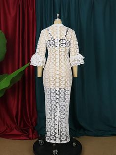 Introducing our African Dashiki Maxi Dress, a stunning fusion of cultural richness and elegant style designed for the modern woman who appreciates the beauty of tradition. This maxi dress features a white lace hollow-out design, adding a touch of sophistication to the vibrant and dynamic Dashiki patterns. The elegant abaya style is perfect for special occasions, parties, or embracing cultural festivities.Crafted with meticulous attention to detail, this dress is a celebration of Muslim Fashion Abayas, African Women Dresses, Black Flared Jeans, Vintage Long Dress, Beach Holiday Dresses, African Dashiki, White Flares, Party Clothes, Long Dress Casual