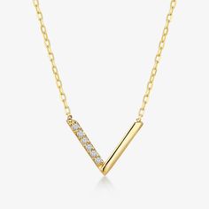 - Made in 14k solid gold set with a high-quality diamond (H Color, SI clarity).- Carat weight: 0.02- Chain length: 18 inches.- Pendant length: 8 mm.- Pendant width: 10 mm. 1 2 14k Solid GoldMade of long lasting, nature friendly recycled gold. 14k gold does not oxidize or discolor making it a perfect option for daily wear. DiamondOur diamonds are obtained through processes that follow ethically conflict-free and socially responsible practices and add value to all components of the procurement pro Formal 14k Gold Diamond Necklace, Gold Sterling Silver Diamond Necklace For Formal, Gold Sterling Silver Diamond Necklace For Formal Occasions, Minimalist 14k Gold Diamond Necklace With Accents, Formal White Gold Diamond Necklace Tarnish Resistant, Minimalist Diamond Jewelry Tarnish Resistant, White Gold Diamond Necklace Tarnish Resistant, Tarnish Resistant Diamond Necklace, Gold Diamond Necklace With Polished Finish