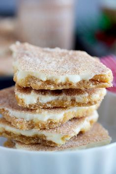 three desserts stacked on top of each other in a white bowl